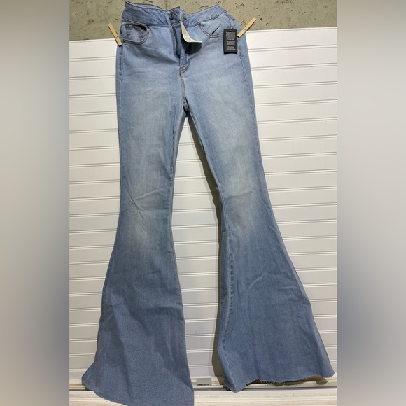 Altar'd State Pants - Brand new flare jeans with cute back lace detail! Stretchy denim!